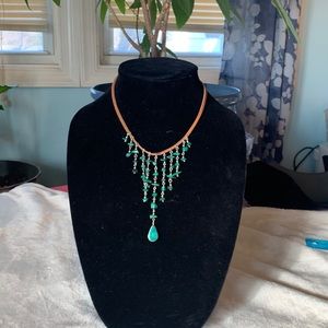 Leather, silver, and turquoise necklace